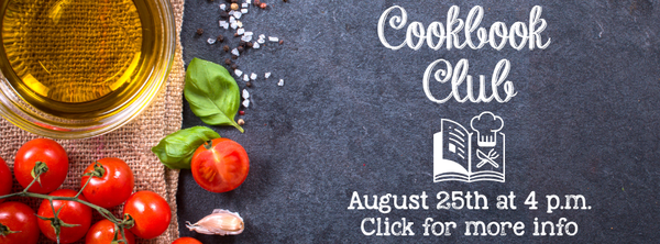 Chalkboard with text advertising cookbook club 